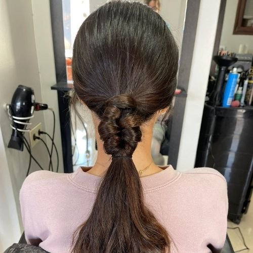 dama con peinado en cabello en Servicios Peluquería Estética El Ejido